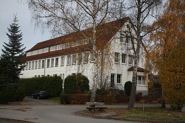 Wird heute als AWO-Begegnungszentrum genutzt: Das Gebäude am Schimmelkamp 23 von der anderen Seite aus gesehen. - © Foto: Kenter