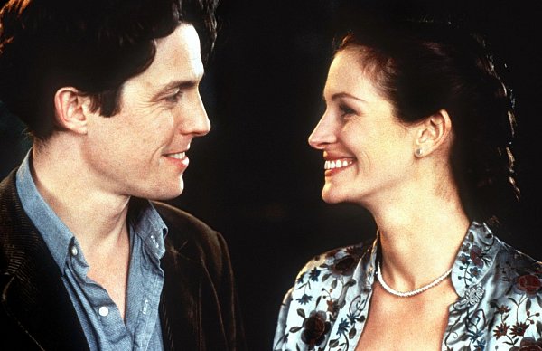 Julia Roberts als Schauspielerin Anna Scott und Hugh Grant als Buchhändler William Thacker in dem britischen Kinofilm "Notting Hill" von 1998. - © dpa - Fotoreport
