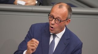 Erstes Wahlkampfduell: Merz attackiert - Scholz verteidigt