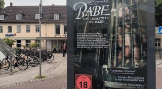 Auffällige Plakate in Güterslohs Innenstadt aufgetaucht - das steckt dahinter