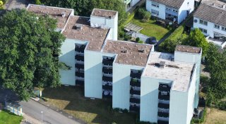 Horror-Wohnblock in einem Bünder Stadtteil steht zum Verkauf