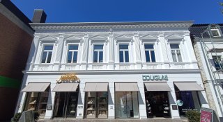 Unstimmigkeiten über historisches Wappen am Gebäude der Douglas-Filiale in Bünde