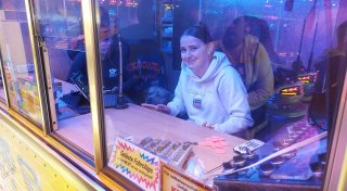 Schausteller-Kinder auf der Oktoberwoche: Lernen zwischen Riesenrad und Autoscooter