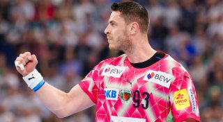 Füchse-Handballer gewinnen Spitzenspiel beim THW Kiel