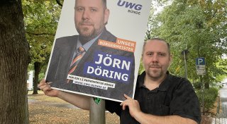 Bürgermeisterkandidat aus Bünde berichtet von Drohungen beim Plakatieren