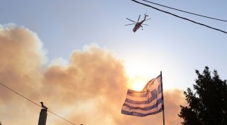 Feuer nahe Athen - Häuser in Flammen