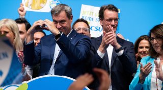 „Schönen Gruß nach Bayern“: Wie Wüst und Söder um die Merz-Nachfolge rangeln