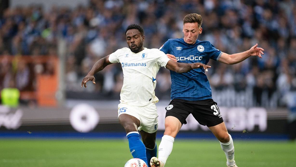 Lieferten sich eine umkämpfte Partie: Arminia Bielefeld und der 1. FC Magdeburg. | © Marius Becker/dpa