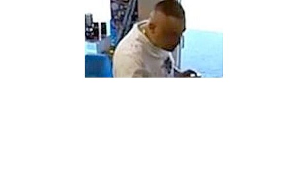 Der gesuchte Komplize mit dem Boxerschnitt. - © Polizei