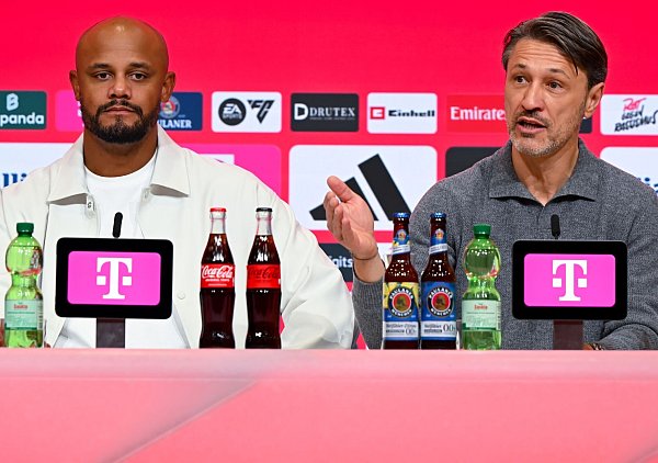 Bayern-Coach Vincent Kompany (l) war zufrieden, BVB-Coach Niko Kovac nicht. - © Sven Hoppe/dpa