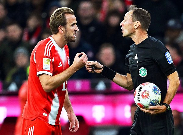 Harry Kane (l) war im Duell mit dem BVB überall im Einsatz. - © Sven Hoppe/dpa