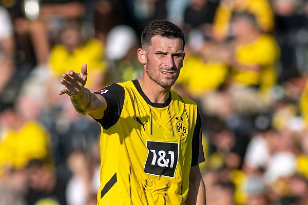 BVB-Geschäftsführer Ricken sieht in Groß eine der neuen Identifikationsfiguren. - © David Inderlied/dpa