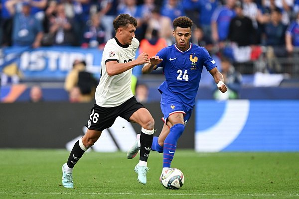 Behauptete sich gegen Champions-League-Sieger Desire Doue: Tom Bischof - © Federico Gambarini/dpa