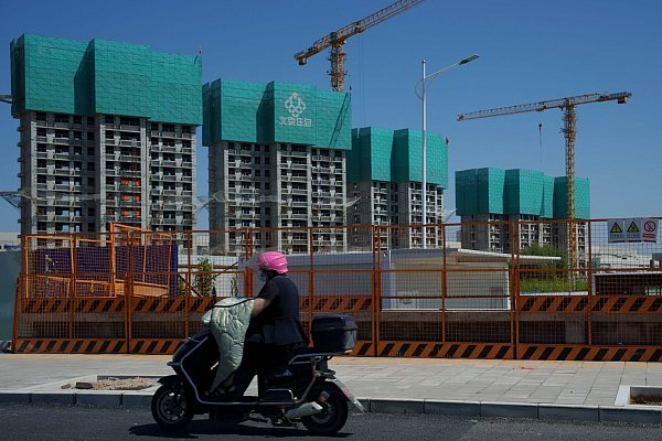 Die Immobilienkrise belastete Chinas Konsum deutlich. (Archivbild) - © Vincent Thian/AP/dpa
