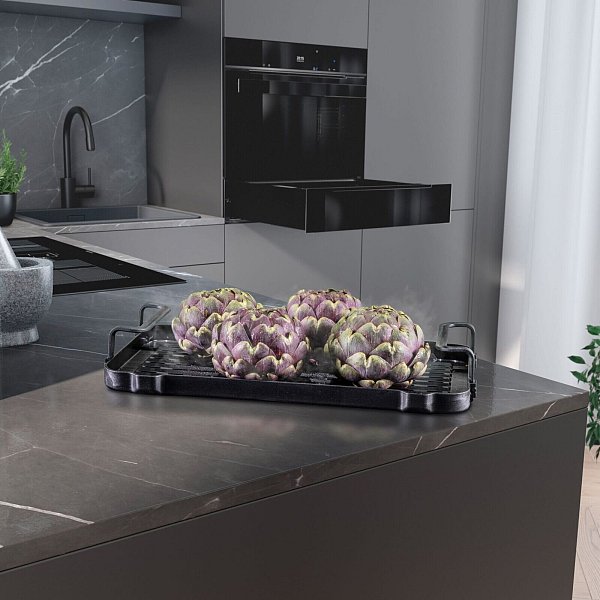 Platzsparend ist eine Dampfschublade, die sich etwa unter dem Backofen einfügen lässt. - © AMK/dpa-tmn