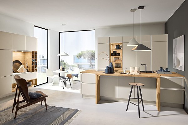 Naturnahe Töne und ruhige Holzoptiken erzeugen eine wohnliche Atmosphäre. - © Nolte Küchen/dpa-tmn