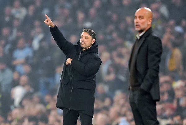 Niko Kovac (l) weiß, woran er mit seinem Team noch arbeiten muss. - © Martin Rickett/PA Wire/dpa