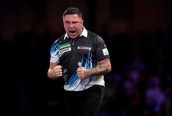 Spielte einst Rugby und glänzt nun am Board: Gerwyn Price. - © Bradley Collyer/PA Wire/dpa
