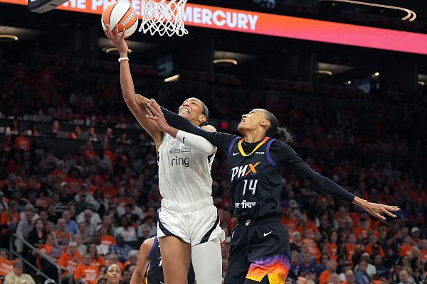 A\\\'ja Wilson (links) erzielte den entscheidenden Korb für die Las Vegas Aces. - © Rick Scuteri/FR157181 AP/AP/dpa