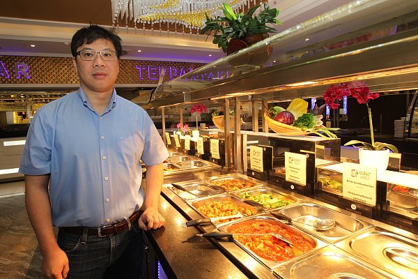 Erfolgreich: Hung Ely von der "Gourmet World" - © Peter Steinert