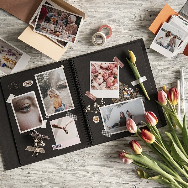Ein Fotobuch bietet Platz für schöne Erinnerungen und kleine Botschaften. - © Symbolfoto: Pixabay