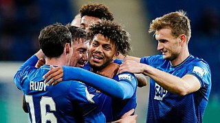 Dortmund und Leipzig weiter - Freiburg rettet sich