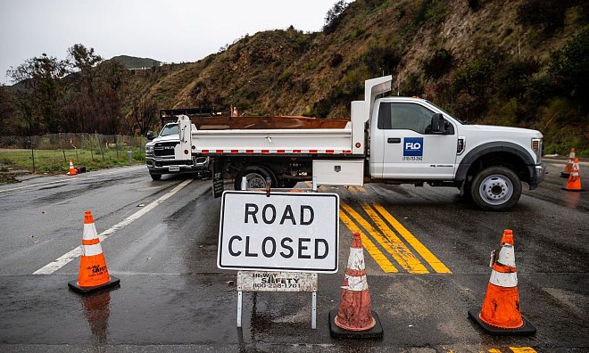 Augenzeugen berichteten nach dem Wintersturm von umgestürzten Bäumen, überschwemmten Straßen und kleineren Erdlöchern. - Ethan Swope/FR171736 AP/AP/dpa
