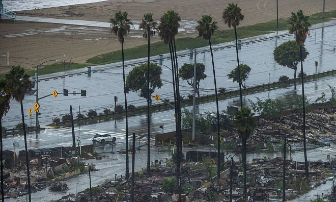Die Behörden warnen von Sturzfluten und Überschwemmungen. - Ethan Swope/AP/dpa