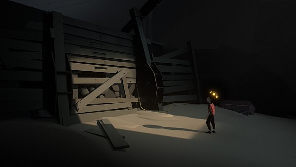 Das Licht weist eindeutig zur Bretterwand, doch hochklettern können wir hier nicht. Dass es dennoch einen Weg gibt, lösen wir bald schon instinktiv. Dafür braucht es keine Erklärung. - © Playdead